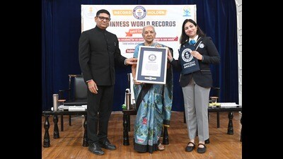 Governor Anandiben Patel receiving a Guinness World Record certificate at Raj Bhawan in Lucknow on Friday (Sourced) Governor Anandiben Patel receiving a Guinness World Record certificate at Raj Bhawan in Lucknow on Friday (Sourced)