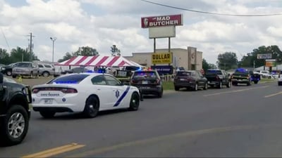 Police respond to the scene of a shooting on Friday, June 21, 2024 in Fordyce, Ark. Arkansas State Police say at least two people were killed and eight wounded in a shooting that occurred at a grocery store in south Arkansas. (KATV via AP) (AP) Police respond to the scene of a shooting on Friday, June 21, 2024 in Fordyce, Ark. Arkansas State Police say at least two people were killed and eight wounded in a shooting that occurred at a grocery store in south Arkansas. (KATV via AP) (AP)
