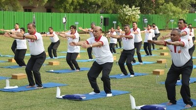 Defence Minister Rajnath Singh, Army chief Gen Manoj Pande, and other officials practice Yoga in Mathura, Uttar Pradesh, celebrating the International Day of Yoga. (PIB)