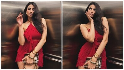 Palak Tiwari's red dress is perfect for a romantic date. The red dress featured a halter neckline and frill patterns. In loose tresses and minimal makeup, Palak complemented her attire. Palak Tiwari's red dress is perfect for a romantic date. The red dress featured a halter neckline and frill patterns. In loose tresses and minimal makeup, Palak complemented her attire. 