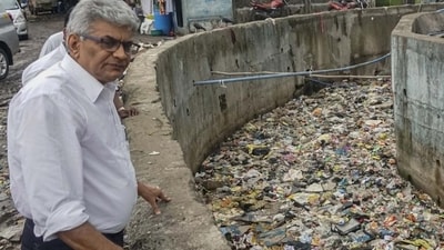 Mumbai, India. June 20, 2024: (Wadala TT Nulla) Former BMC opposition leader Ravi Raja highlighted the BMC's failure in the Pre-Monsoon Nullah cleaning drive. Ravi Raja alleged that major Nullah cleaning was not properly done in the Walada area. June 20, 2024. (Photo by Raju Shinde/HT Photo) Mumbai, India. June 20, 2024: (Wadala TT Nulla) Former BMC opposition leader Ravi Raja highlighted the BMC's failure in the Pre-Monsoon Nullah cleaning drive. Ravi Raja alleged that major Nullah cleaning was not properly done in the Walada area. June 20, 2024. (Photo by Raju Shinde/HT Photo)