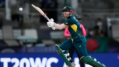 Chasing 141, Australia reached 100/2 in 11.2 overs, with rain stopping play. Play didn't resume and by the DLS method, they were well ahead, winning by 28 runs. David Warner (53*) got an unbeaten half-century for Australia. (PTI) Chasing 141, Australia reached 100/2 in 11.2 overs, with rain stopping play. Play didn't resume and by the DLS method, they were well ahead, winning by 28 runs. David Warner (53*) got an unbeaten half-century for Australia. (PTI)