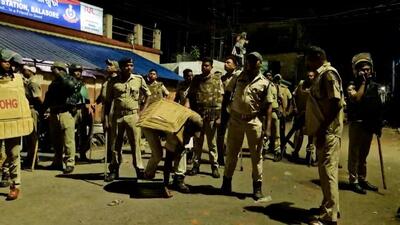 Police officials in Balasore to enforce the curfew. (HT Photo)