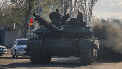 Russian army servicemen drive a tank on a street in Donetsk, Russian-controlled Ukraine (REUTERS FILE) Russian army servicemen drive a tank on a street in Donetsk, Russian-controlled Ukraine (REUTERS FILE)