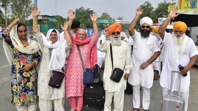 Sikh pilgrims leaving for Pakistan to observe the death anniversary of Maharaja Ranjit Singh, in Amritsar on Friday. (Sameer Sehgal/HT)