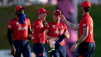 England celebrate a wicket. (AP) England celebrate a wicket. (AP)
