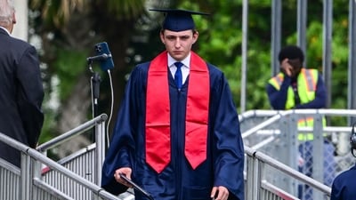 Barron Trump, son of former US President Donald Trump and former First Lady Melania Trump, takes part in his graduation at Oxbridge Academy in Palm Beach, Florida, May 17, 2024. (AFP) Barron Trump, son of former US President Donald Trump and former First Lady Melania Trump, takes part in his graduation at Oxbridge Academy in Palm Beach, Florida, May 17, 2024. (AFP)