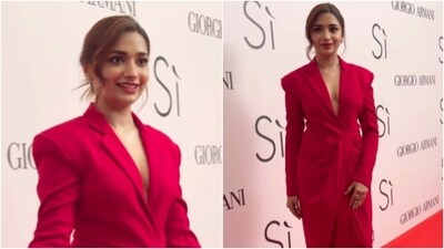 Jiya Shankar looked stunning in a red hot wrapped gown featuring a plunging neckline, lapel collars and full sleeves. With hair tied into a messy bun, Jiya looked perfect. (Instagram/@viralbhayani) Jiya Shankar looked stunning in a red hot wrapped gown featuring a plunging neckline, lapel collars and full sleeves. With hair tied into a messy bun, Jiya looked perfect. (Instagram/@viralbhayani)