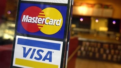 The Payment & Clearing Association of China is proposing trimming the fee to 1.5 per cent from 2-3 per cent. (AP File Photo) The Payment & Clearing Association of China is proposing trimming the fee to 1.5 per cent from 2-3 per cent. (AP File Photo)