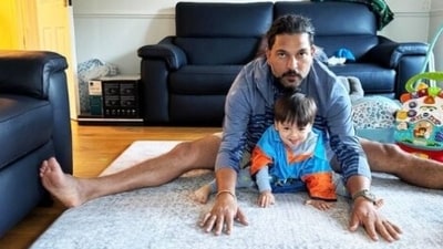 Yuvraj Singh shared a picture of himself performing a leg stretching routine with his "new Yoga teacher" for company. The picture features a pint-sized Orion smiling while posing with dad Yuvraj. (Instagram) Yuvraj Singh shared a picture of himself performing a leg stretching routine with his "new Yoga teacher" for company. The picture features a pint-sized Orion smiling while posing with dad Yuvraj. (Instagram)