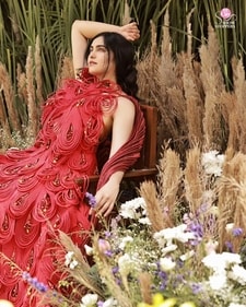 Amid a dreamy floral setup, the actor stuns in an artsy red dew drop-inspired dress from designer Vaishali S that is adorned with cord detailing to create a ripple-like effect (Photo: Amit Khanna) Amid a dreamy floral setup, the actor stuns in an artsy red dew drop-inspired dress from designer Vaishali S that is adorned with cord detailing to create a ripple-like effect (Photo: Amit Khanna)
