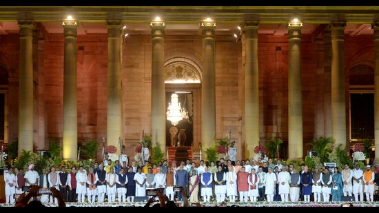 New Delhi, Jun 10 (ANI): President Droupadi Murmu and Vice President Jagdeep Dhankhar pose for a group picture with the newly sworn-in Prime Minister Narendra Modi and Union Council of Ministers during the oath-taking ceremony, at Rashtrapati Bhavan, in New Delhi on Sunday. (ANI Photo) (ANI/ PIB)