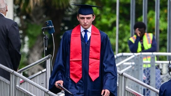 Barron Trump, son of former US President Donald Trump and former First Lady Melania Trump, takes part in his graduation at Oxbridge Academy in Palm Beach, Florida, May 17, 2024. (AFP)