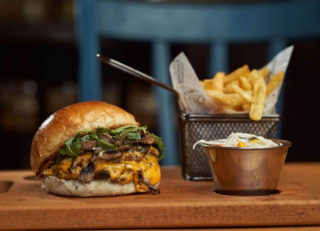 Joel Robuchon puts foie gras into the burgers he serves at his L’Atelier chain. Joel Robuchon puts foie gras into the burgers he serves at his L’Atelier chain.
