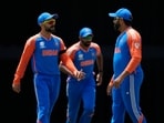 India's Virat Kohli, left, speaks to captain Rohit Sharma, right, during the ICC Men's T20 World Cup cricket match between Afghanistan and India India's Virat Kohli, left, speaks to captain Rohit Sharma, right, during the ICC Men's T20 World Cup cricket match between Afghanistan and India