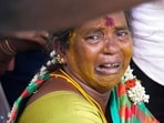 Kallakurichi: Relatives mourn near the mortal remains of people who died after consuming spurious liquor, in Kallakurichi, Friday, June 21, 2024.