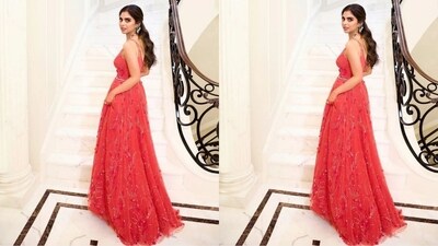 For the performance by Katy Perry, she rewore a custom couture Dior gown from her own wedding to Anand Piramal. The gown is embroidered with their names and wedding date, adding a personalised touch. The intricate embellishments and pearl belt further elevated her look. (Instagram/@ambani_update) For the performance by Katy Perry, she rewore a custom couture Dior gown from her own wedding to Anand Piramal. The gown is embroidered with their names and wedding date, adding a personalised touch. The intricate embellishments and pearl belt further elevated her look. (Instagram/@ambani_update)