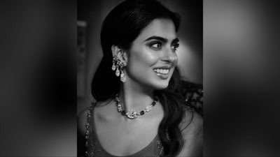 She styled her look with a choker necklace featuring luxurious diamonds and rubies, paired with matching triple-layered earrings. With darkened brows, nude eyeshadow, a glowy base, luminous highlighter and glossy lipstick, she looked absolutely stunning. (Instagram/@ambani_update) She styled her look with a choker necklace featuring luxurious diamonds and rubies, paired with matching triple-layered earrings. With darkened brows, nude eyeshadow, a glowy base, luminous highlighter and glossy lipstick, she looked absolutely stunning. (Instagram/@ambani_update)