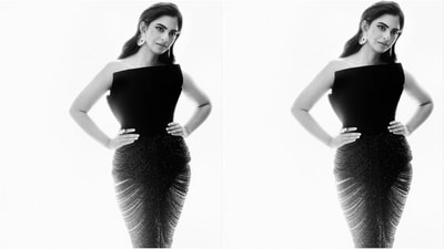 Her black bodycon look exudes sheer glamour. It features an off-shoulder neckline and a body-hugging fit that accentuates her gorgeous curves. The sheer pattern at the bottom adds an extra touch of drama to her ensemble. Styled with a pair of oversized diamond statement earrings, she oozes oomph. (Instagram/@ambani_update) Her black bodycon look exudes sheer glamour. It features an off-shoulder neckline and a body-hugging fit that accentuates her gorgeous curves. The sheer pattern at the bottom adds an extra touch of drama to her ensemble. Styled with a pair of oversized diamond statement earrings, she oozes oomph. (Instagram/@ambani_update)