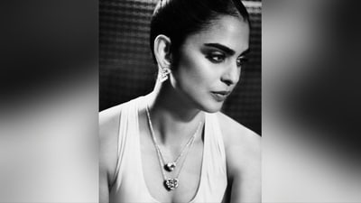 Her makeup look consists of darkened brows, shimmering cat-eye shadow, mascara-coated lashes, contoured cheekbones, luminous highlighter, and glossy lipstick. She completed the look with her tresses tied in a neat bun and a stacked pendant necklace adorning her neck. (Instagram/@ambani_update) Her makeup look consists of darkened brows, shimmering cat-eye shadow, mascara-coated lashes, contoured cheekbones, luminous highlighter, and glossy lipstick. She completed the look with her tresses tied in a neat bun and a stacked pendant necklace adorning her neck. (Instagram/@ambani_update)