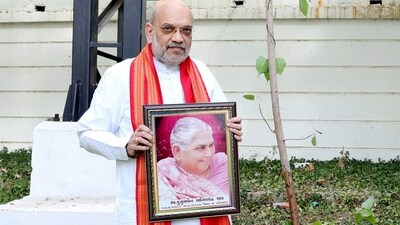 Union Home Minister Amit Shah after planting a tree in the name of his late mother under the "Ek Ped Maa Ke Naam'' campaign. (PTI) Union Home Minister Amit Shah after planting a tree in the name of his late mother under the "Ek Ped Maa Ke Naam'' campaign. (PTI)