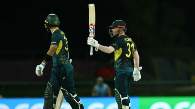 Australia's David Warner (R) celebrates after scoring a half-century (50 runs) during the ICC men's Twenty20 World Cup 2024 Super Eight cricket match between Australia and Bangladesh at Sir Vivian Richards Stadium in North Sound, Antigua and Barbuda. (AFP) Australia's David Warner (R) celebrates after scoring a half-century (50 runs) during the ICC men's Twenty20 World Cup 2024 Super Eight cricket match between Australia and Bangladesh at Sir Vivian Richards Stadium in North Sound, Antigua and Barbuda. (AFP)