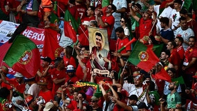 Supporters of Portugal hold an image of Portugal's forward #07 Cristiano Ronaldo in the tribune prior to the UEFA Euro 2024 Group F football match between Portugal and the Czech Republic at the Leipzig Stadium (AFP) Supporters of Portugal hold an image of Portugal's forward #07 Cristiano Ronaldo in the tribune prior to the UEFA Euro 2024 Group F football match between Portugal and the Czech Republic at the Leipzig Stadium (AFP)