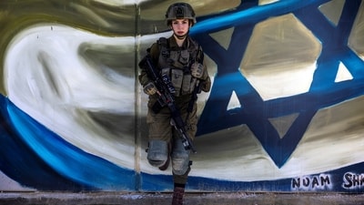 With many Israelis gripped by a sense of insecurity following Hamas's unprecedented October 7 attack, the number of women applying for gun permits has soared, while feminist groups have criticised the rush to arms. (REUTERS)