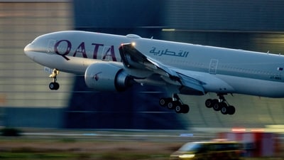 A woman bagged a business class seat on a Qatar Airways flight after running into the CEO of the airline. (AP)