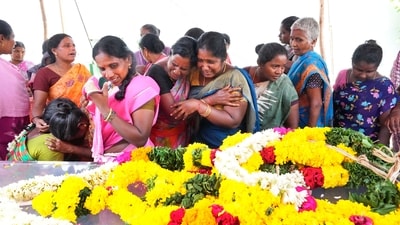 Relatives mourn near the mortal remains of people who died after consuming spurious liquor, in Kallakurichi. (PTI) Relatives mourn near the mortal remains of people who died after consuming spurious liquor, in Kallakurichi. (PTI)