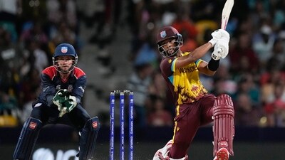 West Indies' Shai Hope hits a six during the men's T20 World Cup cricket match between the USA and the West Indies (PTI) West Indies' Shai Hope hits a six during the men's T20 World Cup cricket match between the USA and the West Indies (PTI)
