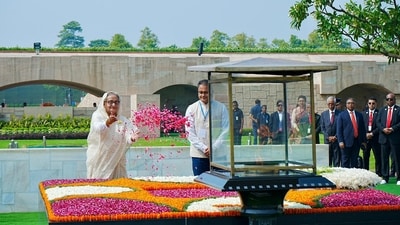 Sheikh Hasina honoured Mahatma Gandhi with a tribute at Rajghat in New Delhi. (PTI) Sheikh Hasina honoured Mahatma Gandhi with a tribute at Rajghat in New Delhi. (PTI)