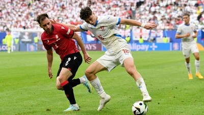 Czech Republic's Ladislav Krejci in action with Georgia's Otar Kakabadze (REUTERS)