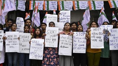 Trinamool Chhatra Parishad (TMCP), students wing of All India Trinamool Congress (TMC) supporters staged a protest against recent scam in NEET and UGC-NET exam in front of Asutosh College in Kolkata, on Saturday. (Samir Jana/ Hindustan Times) Trinamool Chhatra Parishad (TMCP), students wing of All India Trinamool Congress (TMC) supporters staged a protest against recent scam in NEET and UGC-NET exam in front of Asutosh College in Kolkata, on Saturday. (Samir Jana/ Hindustan Times)