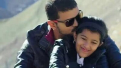 It’s rare for his pictures with his family, like this one with his daughter Divya Saasha, to find their way online. It’s rare for his pictures with his family, like this one with his daughter Divya Saasha, to find their way online.