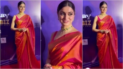 Divya Khosla Kumar recently attended an award show and took the red carpet by storm in six yards of grace. Her saree in a mesmerising shade of pink with gorgeous golden borders, was elegantly draped, allowing the pallu to fall beautifully from her shoulders. She paired it with a sleeveless pink blouse that perfectly complemented her saree look. With a choker necklace, glamorous makeup, and a neat bun, she grabbed the limelight. (Instagram) Divya Khosla Kumar recently attended an award show and took the red carpet by storm in six yards of grace. Her saree in a mesmerising shade of pink with gorgeous golden borders, was elegantly draped, allowing the pallu to fall beautifully from her shoulders. She paired it with a sleeveless pink blouse that perfectly complemented her saree look. With a choker necklace, glamorous makeup, and a neat bun, she grabbed the limelight. (Instagram)
