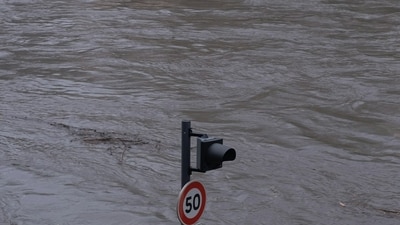 Mexico wildfires followed by flash floods; thousands evacuated and two killed.