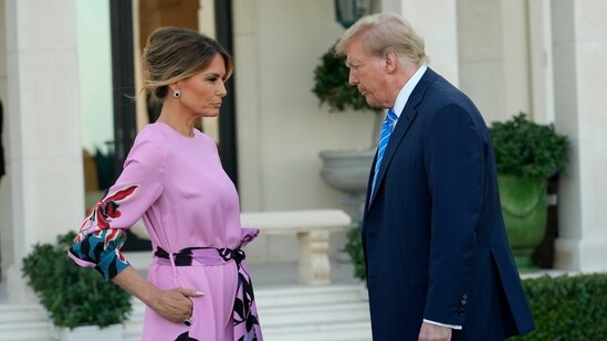 Former President Donald Trump, right, stands with Melania Trump as they arrive for a GOP fundraiser, Saturday, April 6, 2024, in Palm Beach, Fla. (AP Photo/Lynne Sladky) (AP)