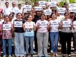 Students hold placards as they stage a protest against the re-examination of the NEET-UG exams, in Rajkot on Sunday. (ANI Photo)