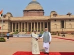 This handout photograph taken and released on June 22, 2024 by the Indian Press Information Bureau (PIB) shows India's Prime Minister Narendra Modi shaking hands with Bangladesh's counterpart Sheikh Hasina (L) after receiving her at the Presidential Palace Rashtrapati Bhavan in New Delhi on June 22, 2024. (Photo by PIB / AFP) (AFP)