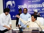 BSP supremo Mayawati with her brother Anand Kumar and nephew Akash Anand during party's office bearers' meeting to review results of general elections. BSP supremo Mayawati with her brother Anand Kumar and nephew Akash Anand during party's office bearers' meeting to review results of general elections.