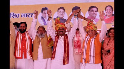 (From R) Union ministers Manohar Lal Khattar and Dharmendra Pradhan with former Haryana home minister Anil Vij and chief minister Nayab Singh Saini in Rohtak on Sunday. (Manoj Dhaka/HT) (From R) Union ministers Manohar Lal Khattar and Dharmendra Pradhan with former Haryana home minister Anil Vij and chief minister Nayab Singh Saini in Rohtak on Sunday. (Manoj Dhaka/HT)