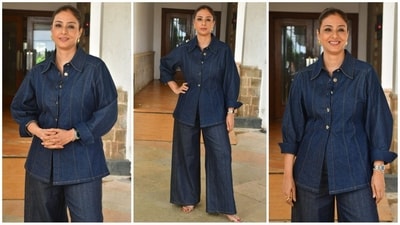 Tabu is here to show you how to slay the denim-on-denim trend with utmost flair. The actress was recently spotted donning a dark blue flared denim top featuring a collared neckline, buttoned bodice, and folded sleeves. She paired it with matching flared pants, exuding stylish vibes. Her ensemble was accessorized with a wristwatch, golden hoop earrings, and a pair of high heels. With glamorous makeup and her tresses tied in a neat bun, she finished off her chic look. (HT photo/VarinderChawla) Tabu is here to show you how to slay the denim-on-denim trend with utmost flair. The actress was recently spotted donning a dark blue flared denim top featuring a collared neckline, buttoned bodice, and folded sleeves. She paired it with matching flared pants, exuding stylish vibes. Her ensemble was accessorized with a wristwatch, golden hoop earrings, and a pair of high heels. With glamorous makeup and her tresses tied in a neat bun, she finished off her chic look. (HT photo/VarinderChawla)