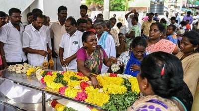 (FILES) A relative weeps next to the dead body of a victim who died after consuming toxic illegal alcohol in Kallakurichi district of India's Tamil Nadu state on June 20, 2024. Drinking liquor was acceptable in a south Indian village until at least 47 people died from a fatal poisoning earlier this week after they consumed arrack, a distilled alcoholic drink. (Photo by R. Satish BABU / AFP) (AFP) (FILES) A relative weeps next to the dead body of a victim who died after consuming toxic illegal alcohol in Kallakurichi district of India's Tamil Nadu state on June 20, 2024. Drinking liquor was acceptable in a south Indian village until at least 47 people died from a fatal poisoning earlier this week after they consumed arrack, a distilled alcoholic drink. (Photo by R. Satish BABU / AFP) (AFP)