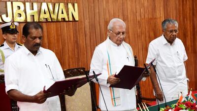 Kerala governor Arif Mohammed Khan administers the oath of office to Mananthavady MLA OR Kelu as the minister of the state during the swearing-in ceremony, at State Raj Bhavan, in Thiruvananthapuram on Sunday. (ANI Photo) (ANI) Kerala governor Arif Mohammed Khan administers the oath of office to Mananthavady MLA OR Kelu as the minister of the state during the swearing-in ceremony, at State Raj Bhavan, in Thiruvananthapuram on Sunday. (ANI Photo) (ANI)