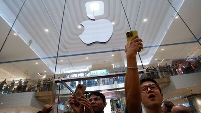 Customers cheer as they enter Apple Inc.'s store during its opening in Kuala Lumpur, Malaysia, on Saturday, June 22, 2024. (Samsul Said/Bloomberg) Customers cheer as they enter Apple Inc.'s store during its opening in Kuala Lumpur, Malaysia, on Saturday, June 22, 2024. (Samsul Said/Bloomberg)