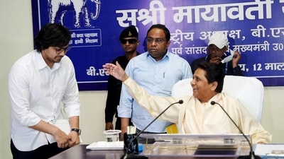 BSP supremo Mayawati with her brother Anand Kumar and nephew Akash Anand during party's office bearers' meeting to review results of general elections. (PTI) BSP supremo Mayawati with her brother Anand Kumar and nephew Akash Anand during party's office bearers' meeting to review results of general elections. (PTI)