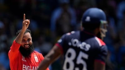 England's Adil Rashid bagged the important wickets of Aaron Jones and Nitish Kumar (PTI)