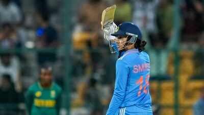 Smriti Mandhana celebrates her fifty during the third women's ODI cricket match between India and South Africa, at M Chinnaswamy Stadium in Bengaluru. (PTI) Smriti Mandhana celebrates her fifty during the third women's ODI cricket match between India and South Africa, at M Chinnaswamy Stadium in Bengaluru. (PTI)
