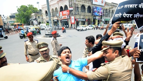 Lucknow, Jun 20 (ANI): Police detain National Students' Union of India (NSUI) supporters and students during a protest demanding the resignation of Union Education Minister Dharmendra Pradhan over the alleged paper leak in the UGC NET exam, in Lucknow on Thursday. (ANI Photo) (Naeem Ansari)